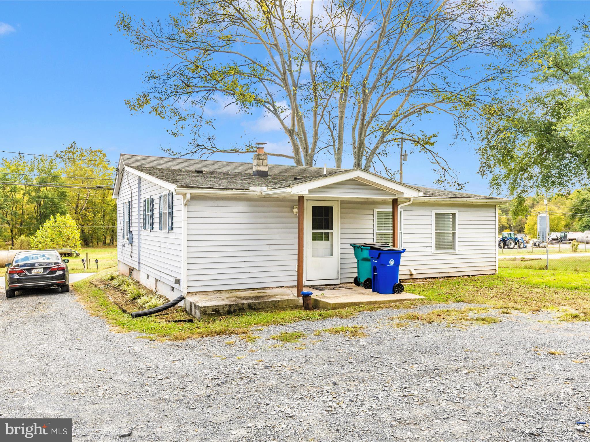 9320 Rocky Ridge Road Rocky Ridge, MD 21778 - Photo 50 of 54 a view of a house with backyard and sitting area