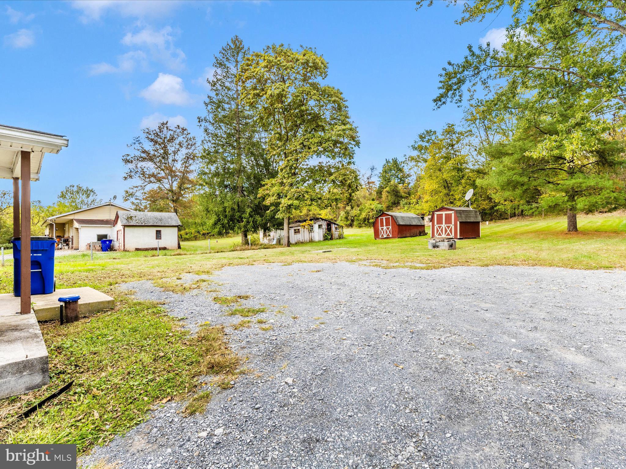 9320 Rocky Ridge Road Rocky Ridge, MD 21778 - Photo 51 of 54 a view of a house with big yard and large trees