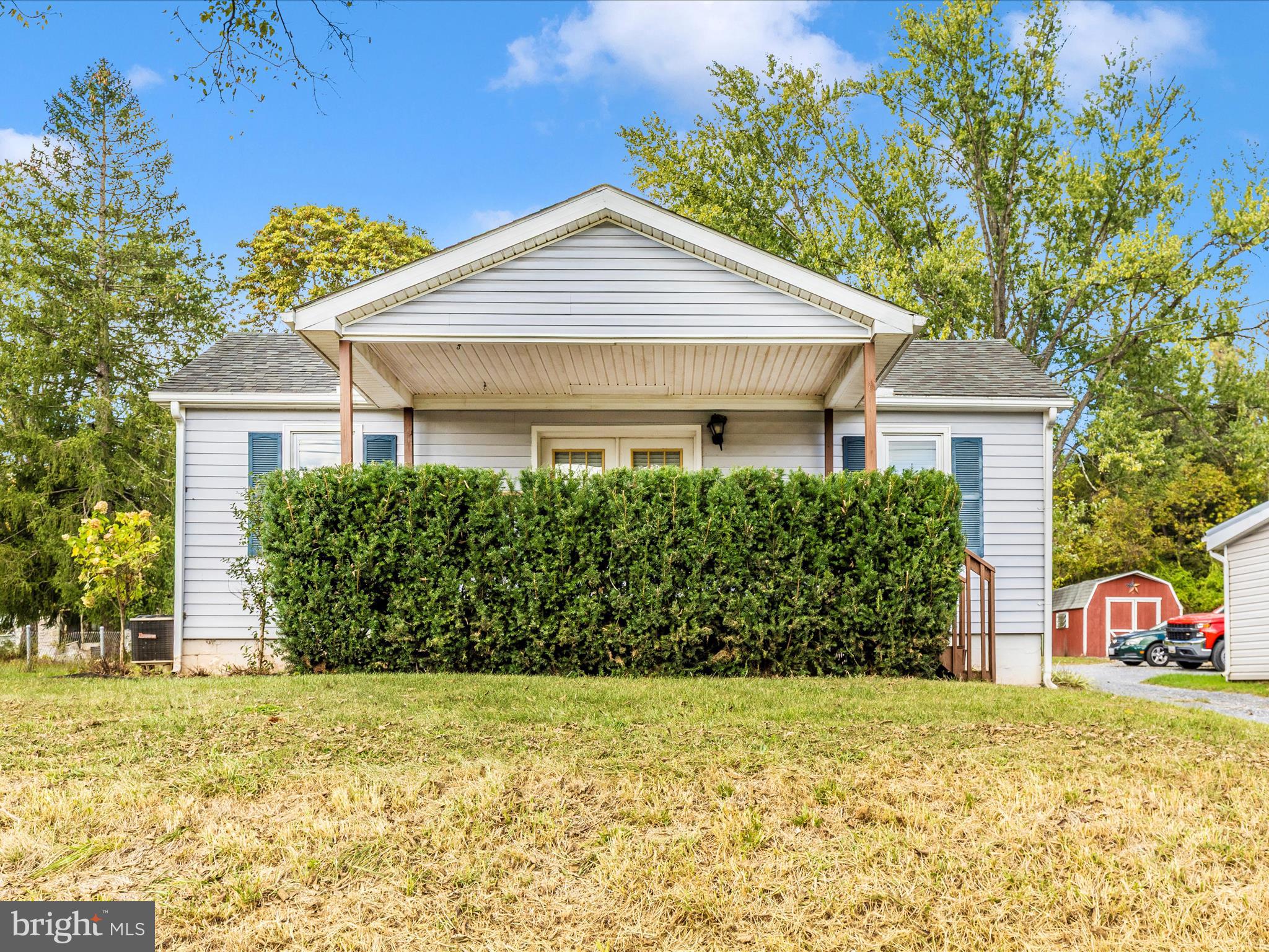9320 Rocky Ridge Road Rocky Ridge, MD 21778 - Photo 54 of 54 a front view of a house with a yard