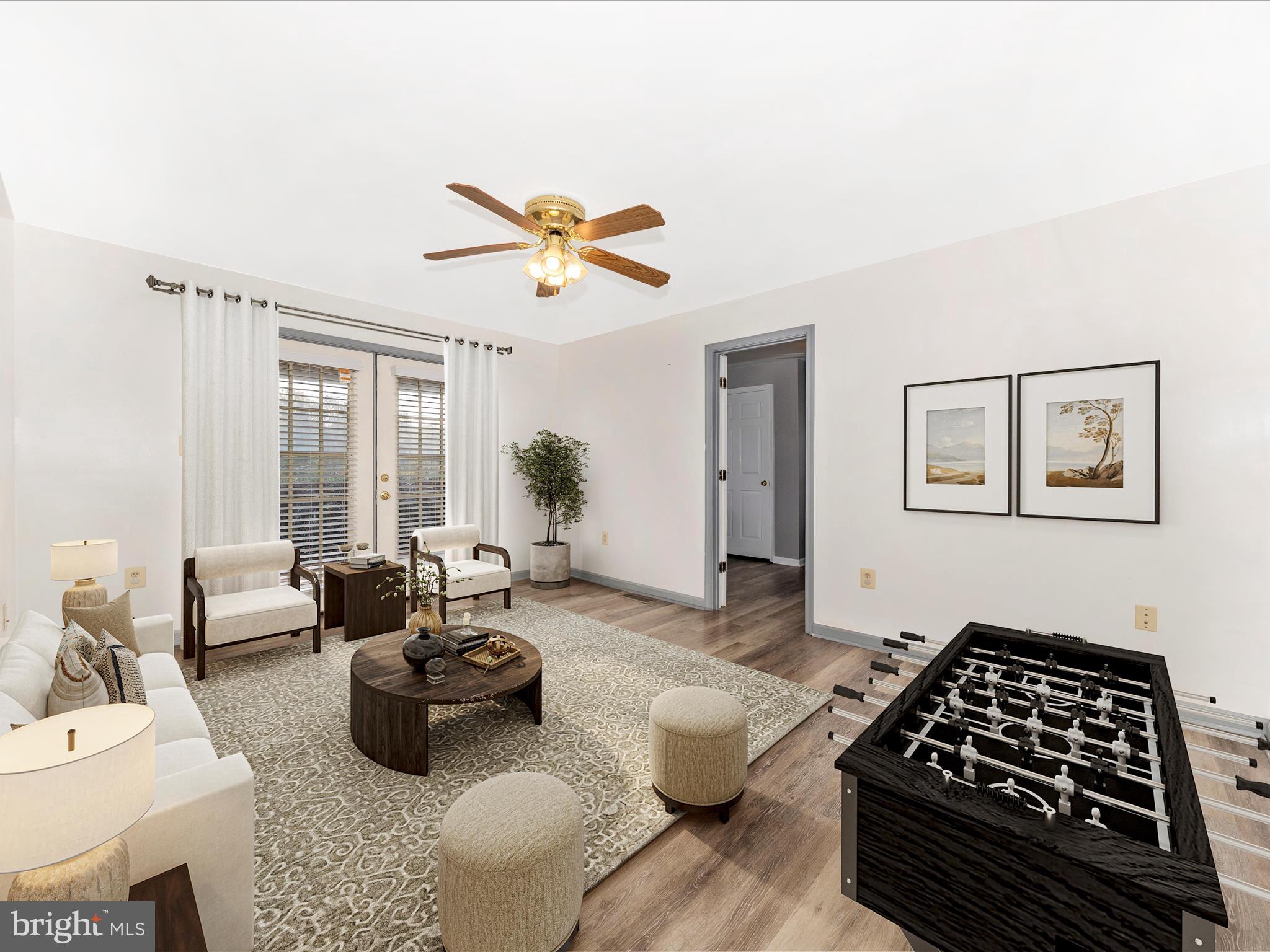 9320 Rocky Ridge Road Rocky Ridge, MD 21778 - Photo 6 of 54 a living room with furniture rug and window