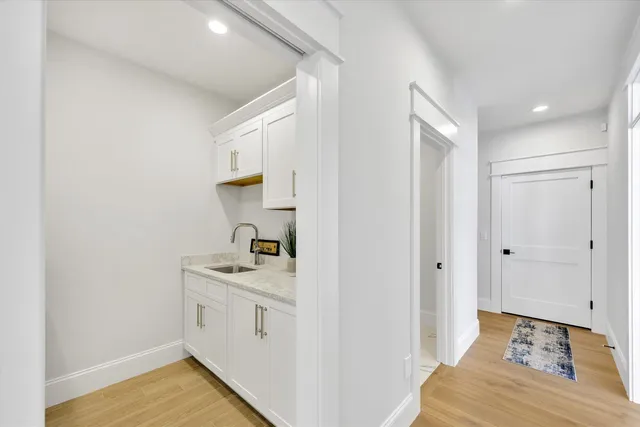a view of swimming pool with outdoor seating and plants