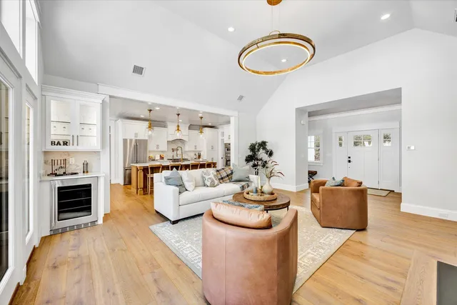 a living room with furniture and fireplace