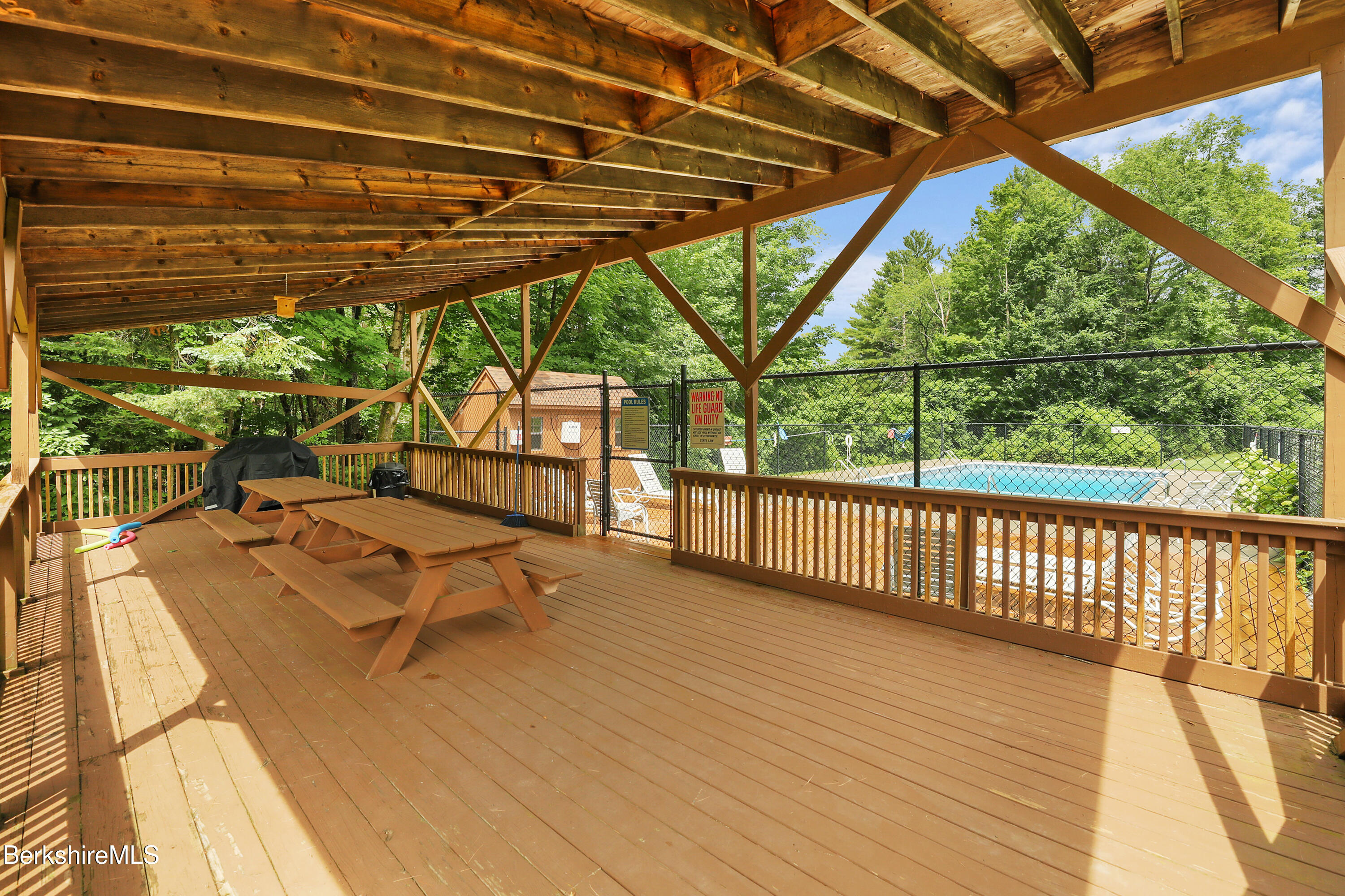 44 Churchill Crest, Unit 44 Pittsfield, MA 01201 - Photo 24 of 25 a view of a balcony with wooden floor