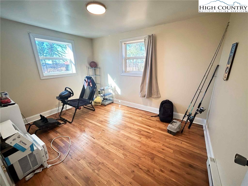 1145 Lazy Branch Road Ennice, NC 28623 - Photo 13 of 13 a living room with furniture and a window