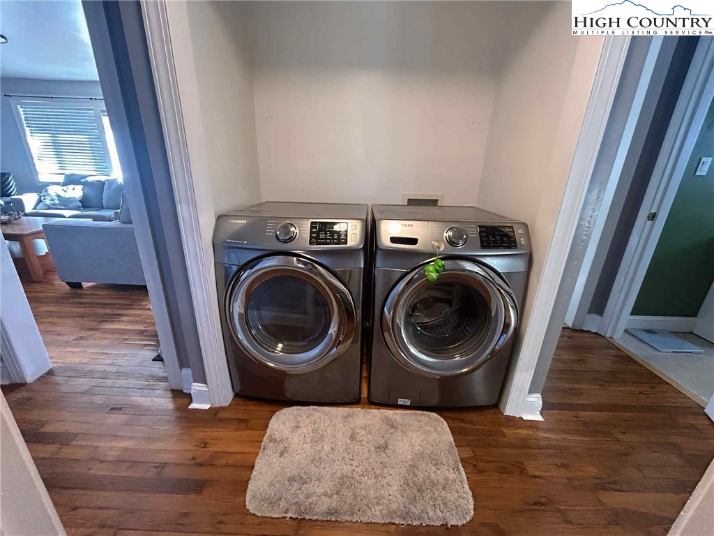 1145 Lazy Branch Road Ennice, NC 28623 - Photo 9 of 13 a utility room with dryer and washer