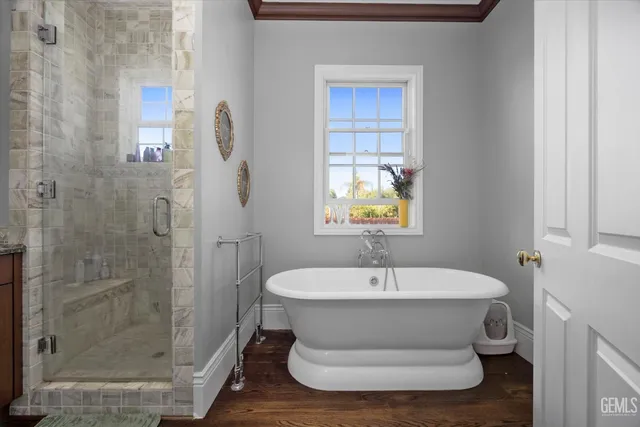 a view of a park with a tree in the background