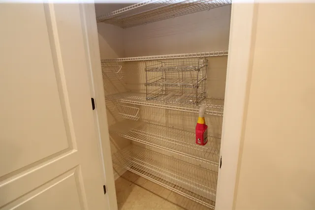 a bathroom with a shower and a sink