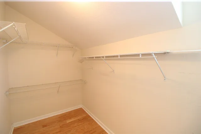 a view of an empty walk in closet