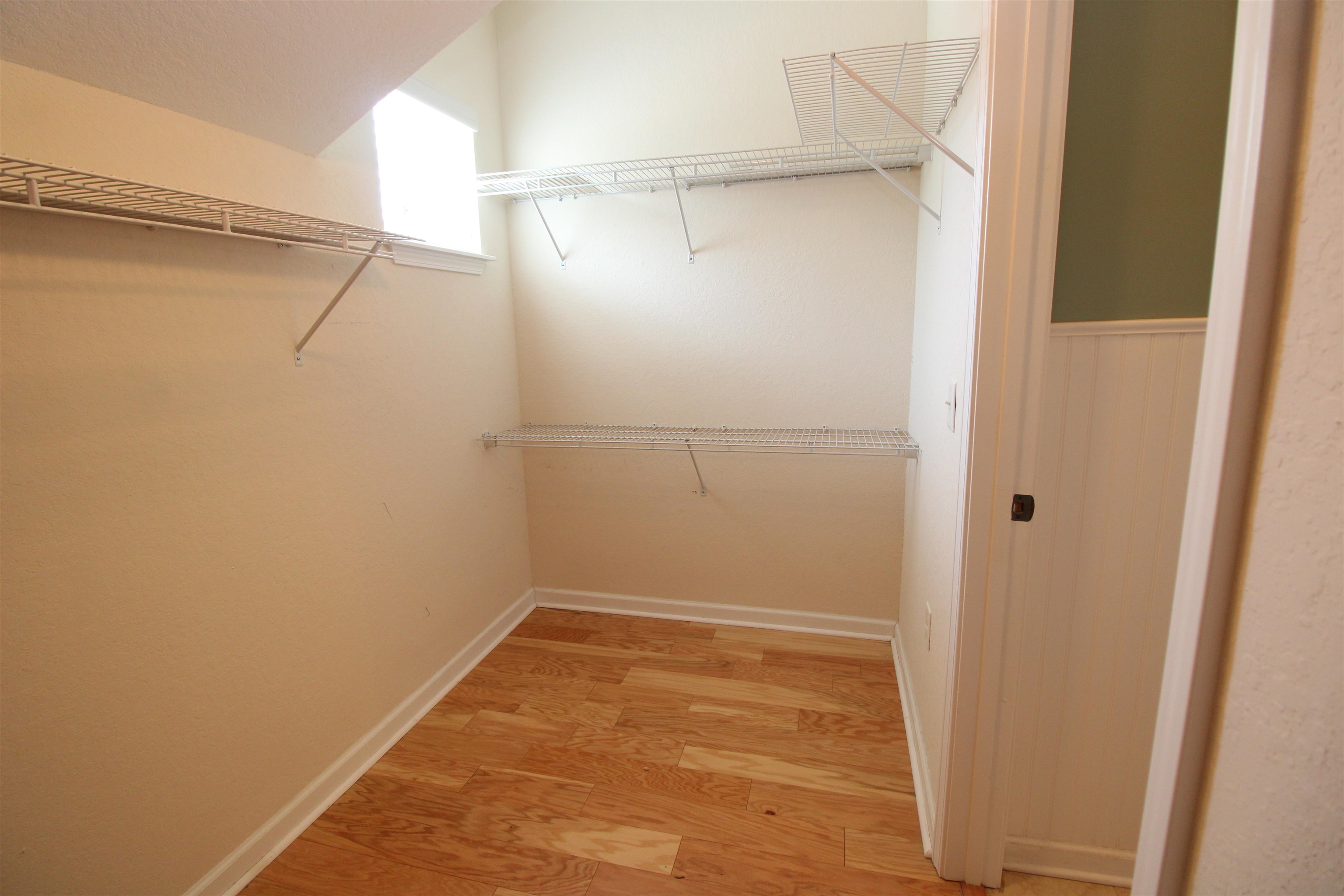 110 Magnolia Crossing Point, Unit 1905 St. Augustine, FL 32086 - Photo 19 of 42 a view of an empty walk in closet