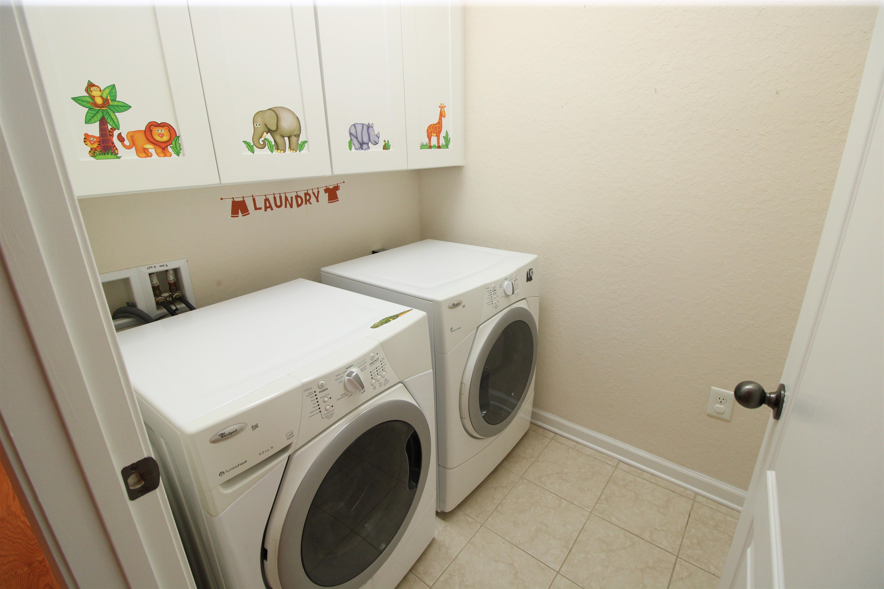 110 Magnolia Crossing Point, Unit 1905 St. Augustine, FL 32086 - Photo 31 of 42 a utility room with dryer and washer
