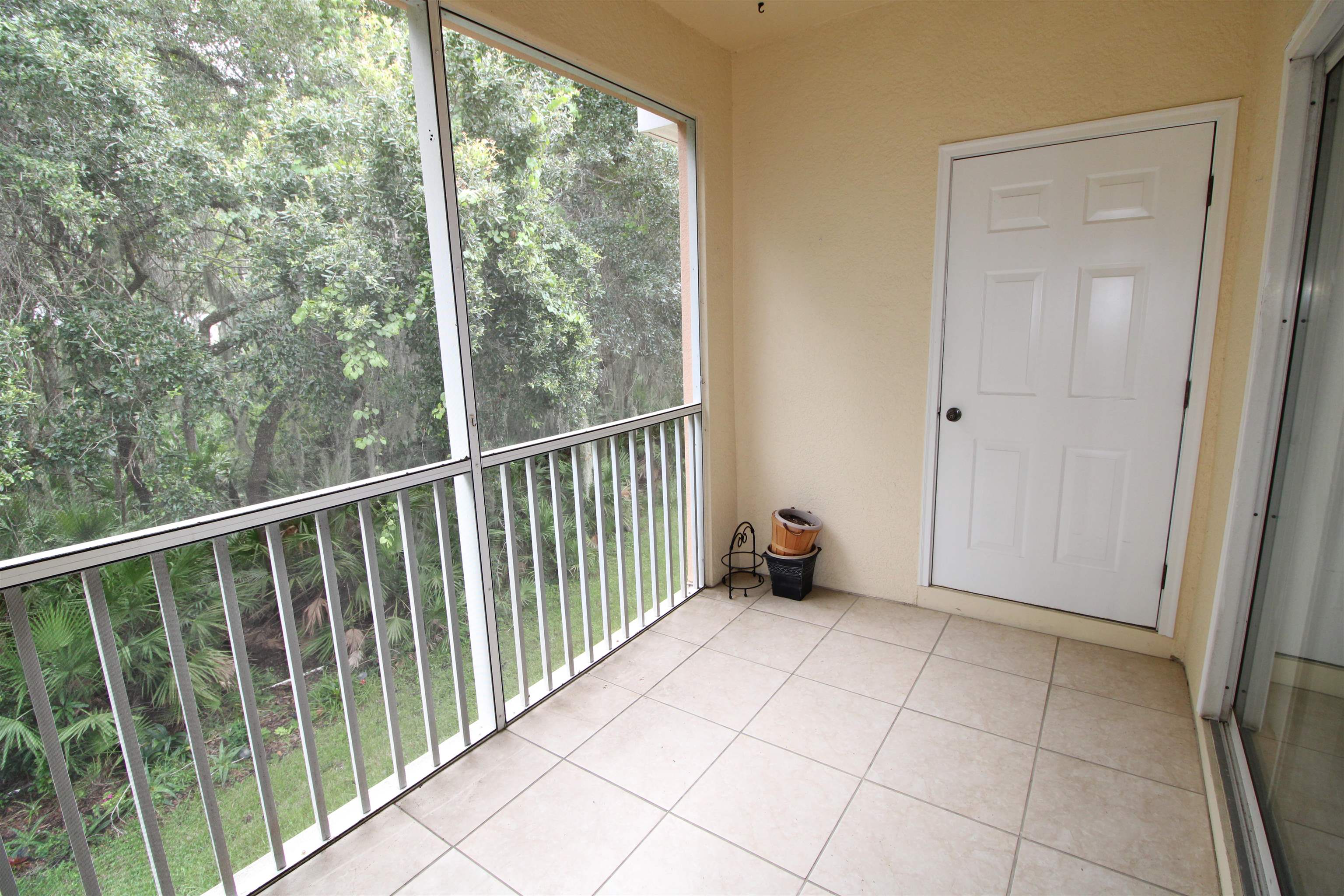110 Magnolia Crossing Point, Unit 1905 St. Augustine, FL 32086 - Photo 35 of 42 a view of a room with sliding door and mountain view