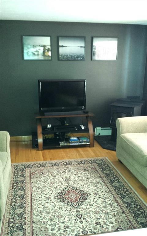22 Rankin Street Springvale, ME 04083 - Photo 8 of 20 Large living room has nice hardwood...