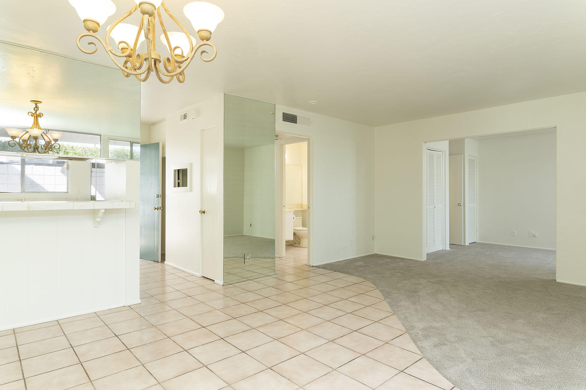 42336 Dunes View Road, Unit 12 Rancho Mirage, CA 92270 - Photo 13 of 29 a view of a kitchen cabinets and wooden floor