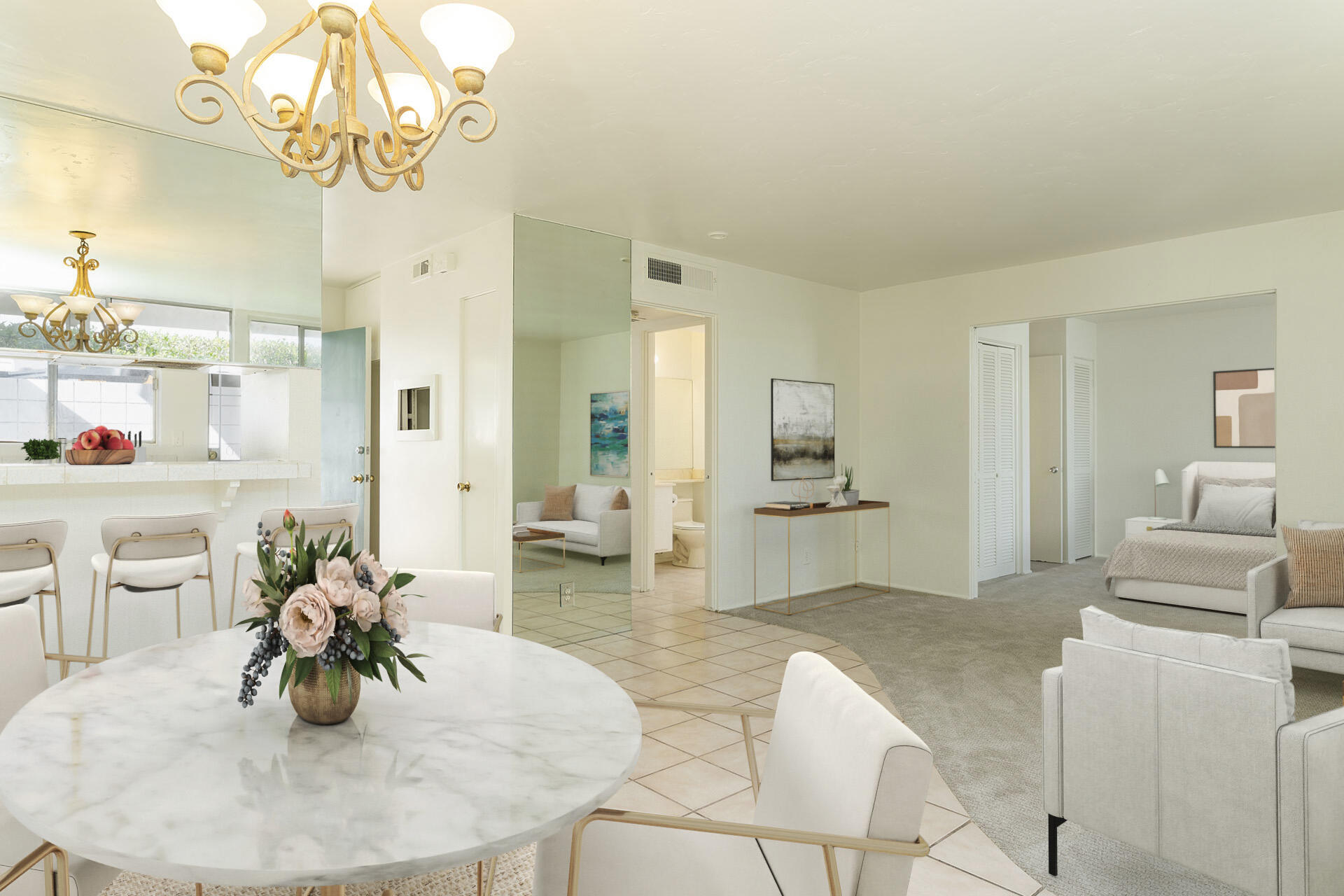 42336 Dunes View Road, Unit 12 Rancho Mirage, CA 92270 - Photo 14 of 29 a dining room with furniture and a chandelier