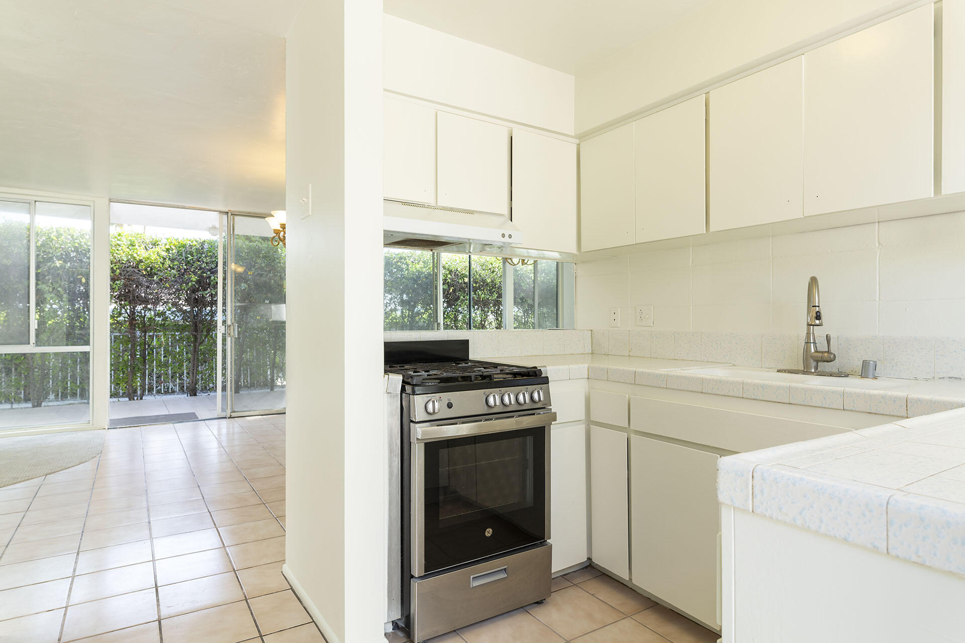 42336 Dunes View Road, Unit 12 Rancho Mirage, CA 92270 - Photo 15 of 29 a kitchen with a stove top oven and sink