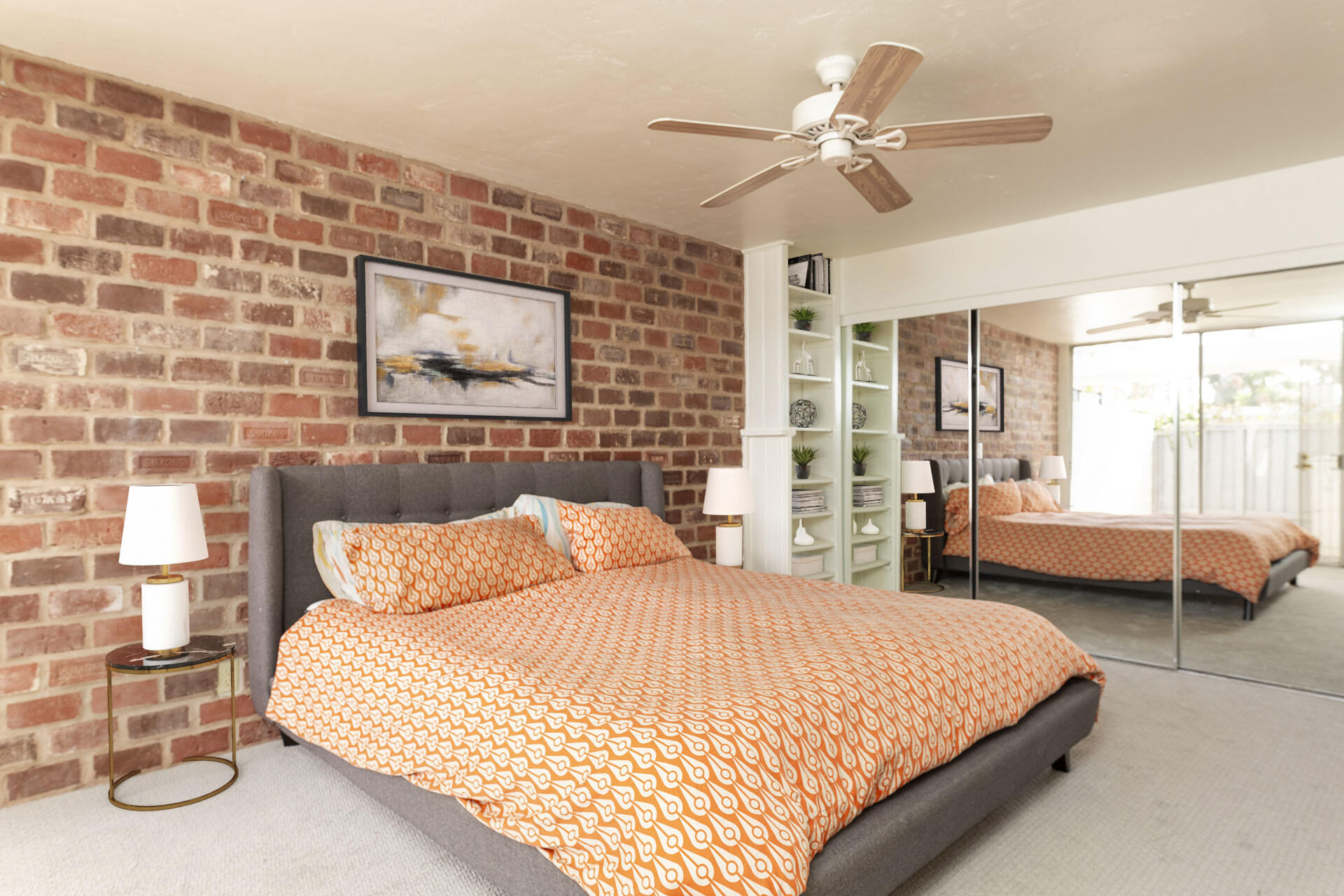 42336 Dunes View Road, Unit 12 Rancho Mirage, CA 92270 - Photo 18 of 29 a bedroom with a large bed and a chandelier