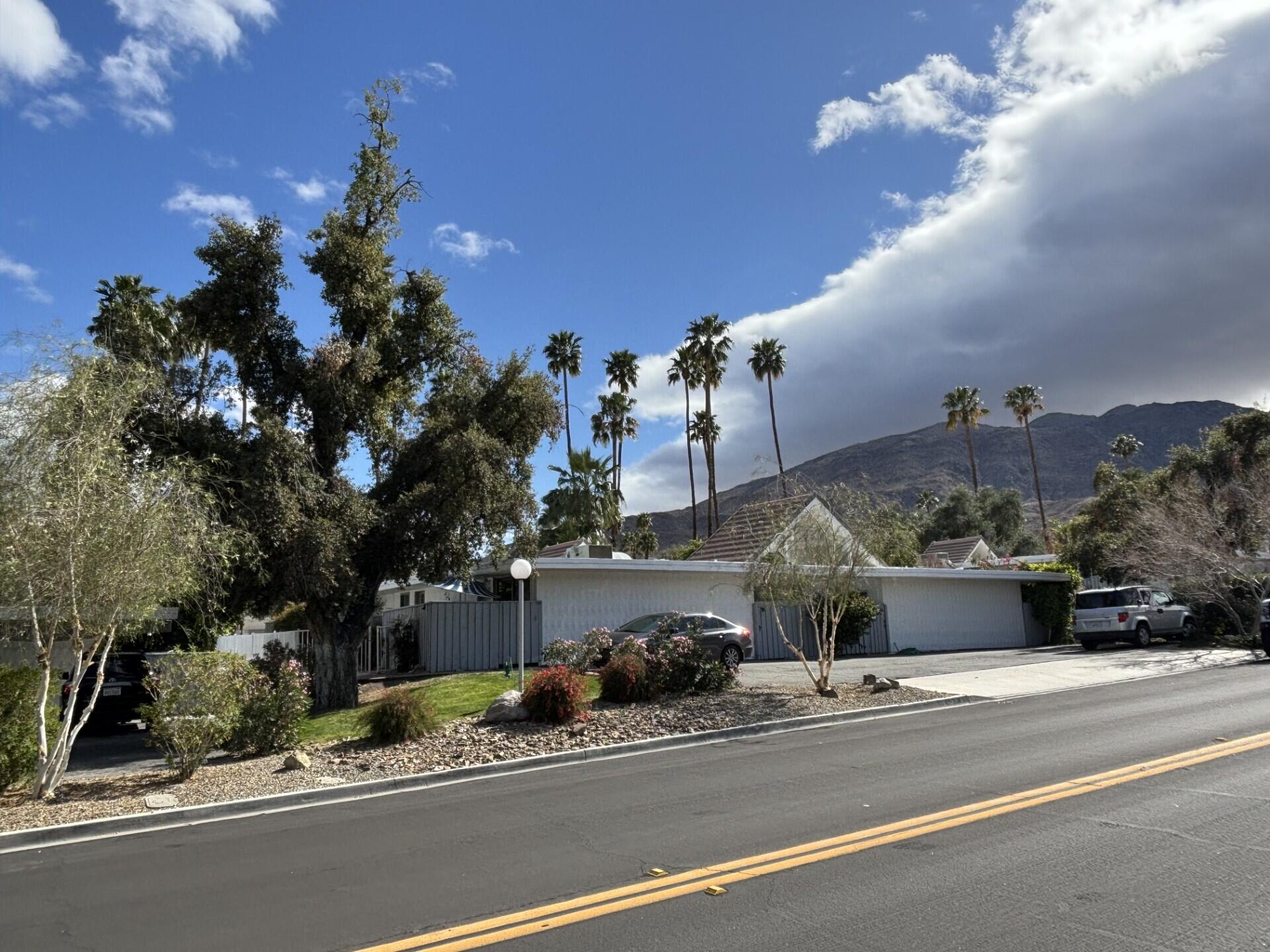 42336 Dunes View Road, Unit 12 Rancho Mirage, CA 92270 - Photo 4 of 29 a view of a building with a street