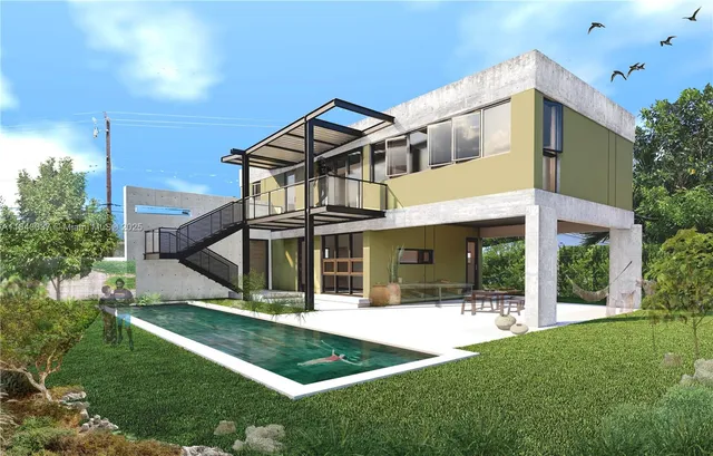 a view of a house with yard and porch