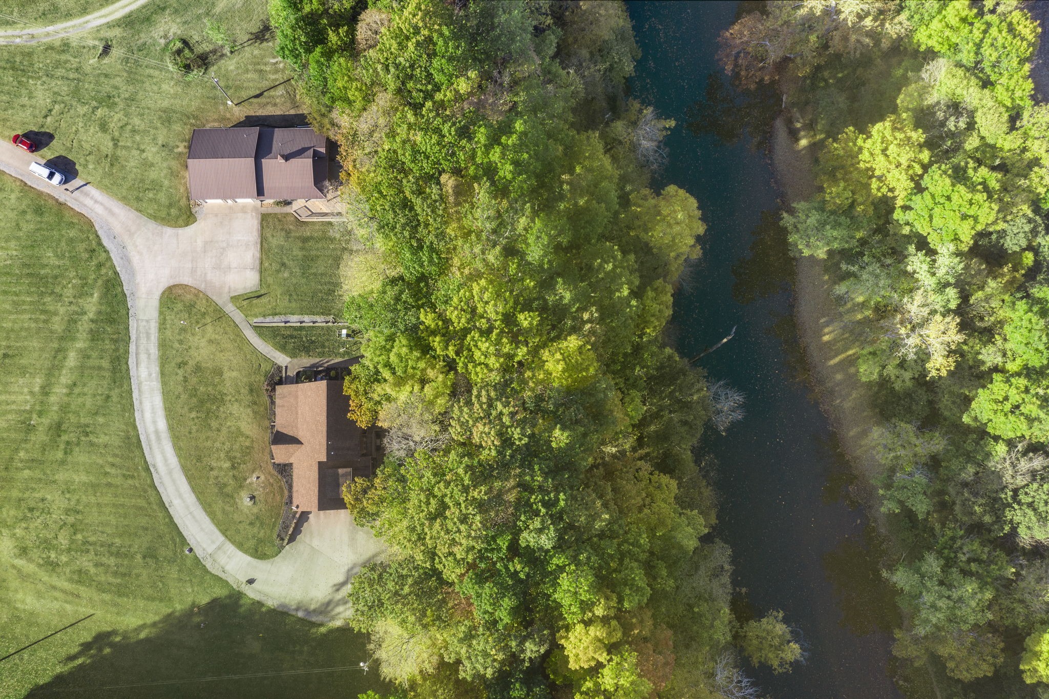 5575 Keysburg Road Adams, TN 37010 - Photo 54 of 70 an aerial view of a house with swimming pool and garden view