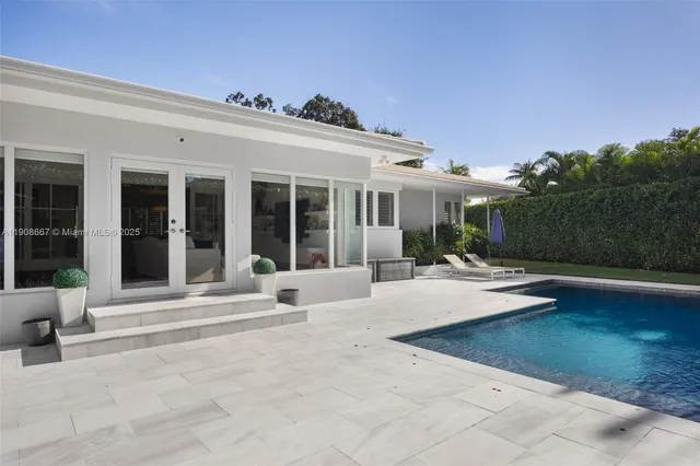 front view of a house with a patio