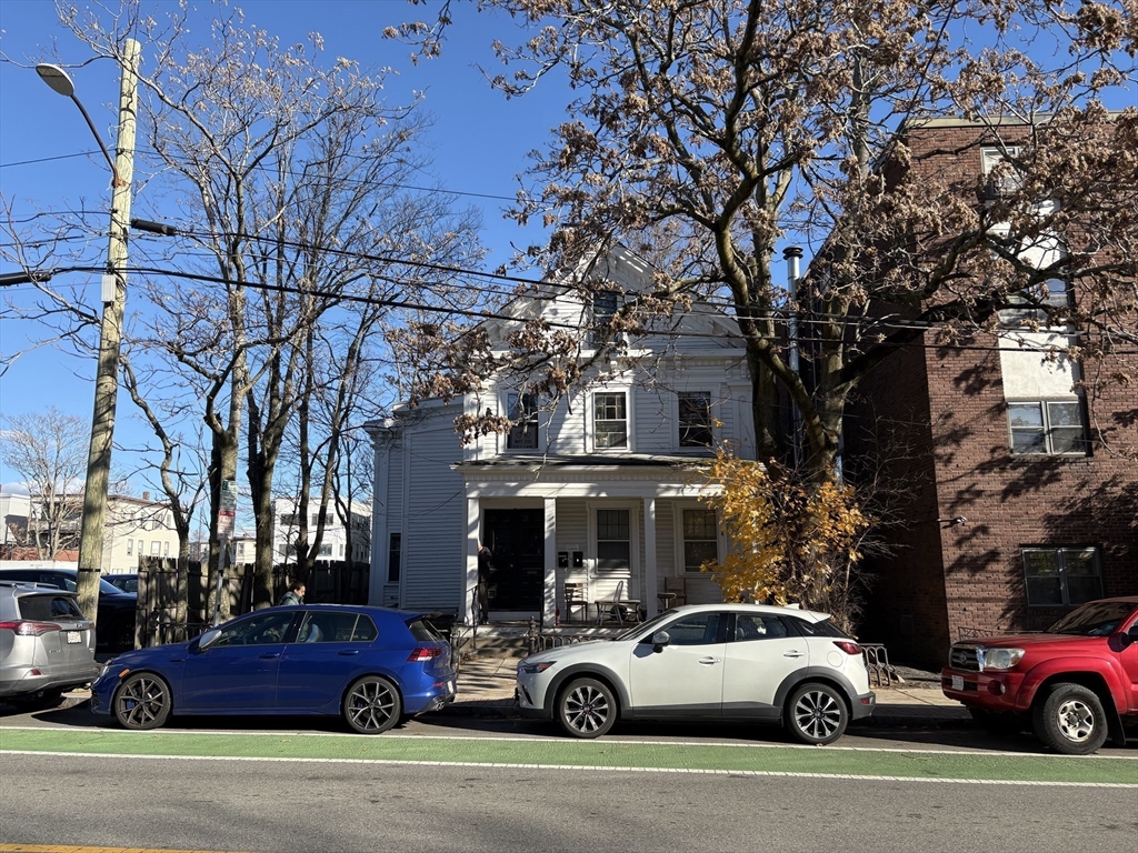 a car parked in front of a building