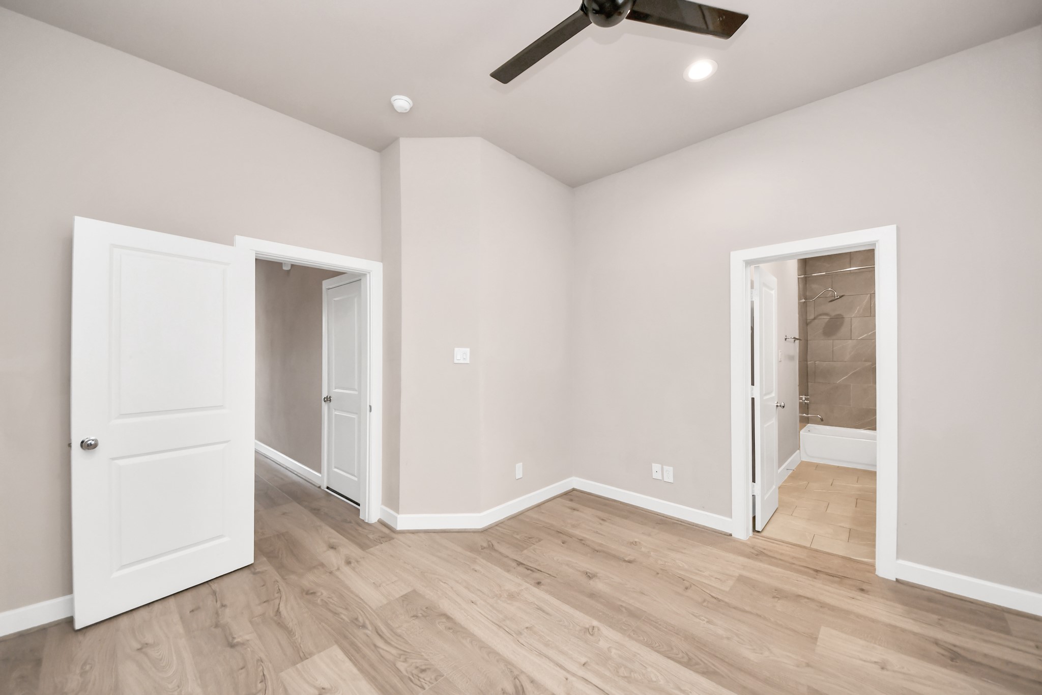 2114 Stuart Street Houston, TX 77004 - Photo 8 of 39 wooden floor in an empty room with a window