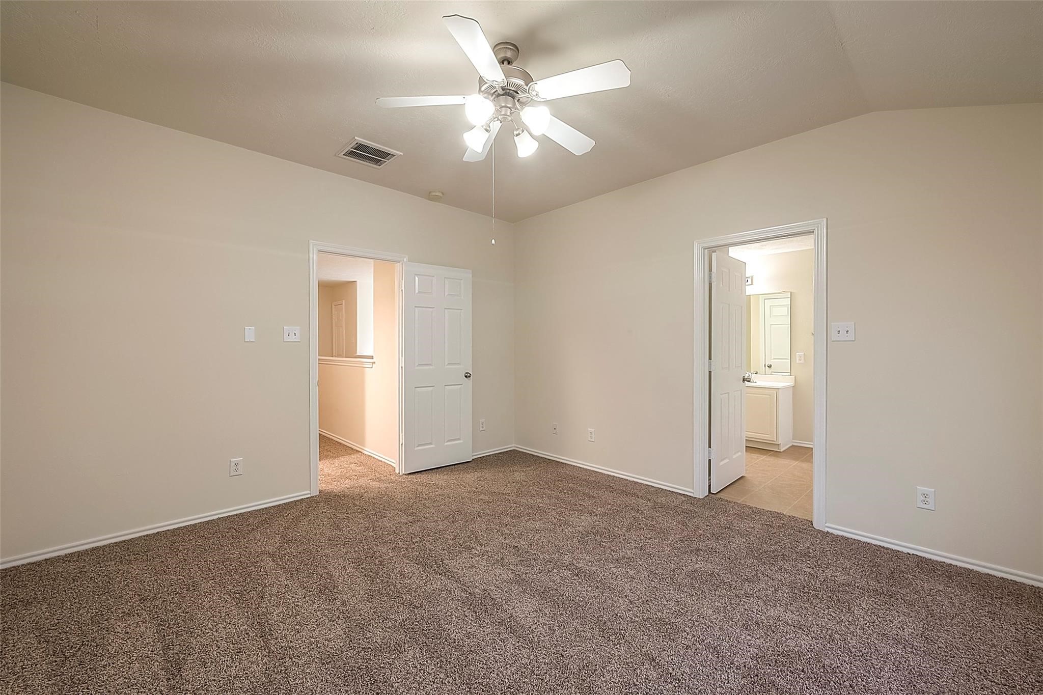 14330 Fairbuff Lane Houston, TX 77014 - Photo 21 of 35 an empty room with fan and windows