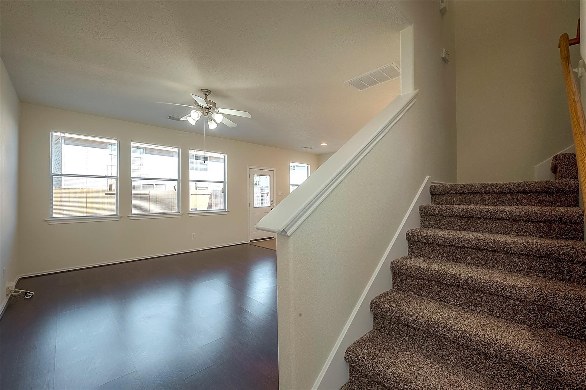 14330 Fairbuff Lane Houston, TX 77014 - Photo 7 of 35 wooden floor in an empty room with a window