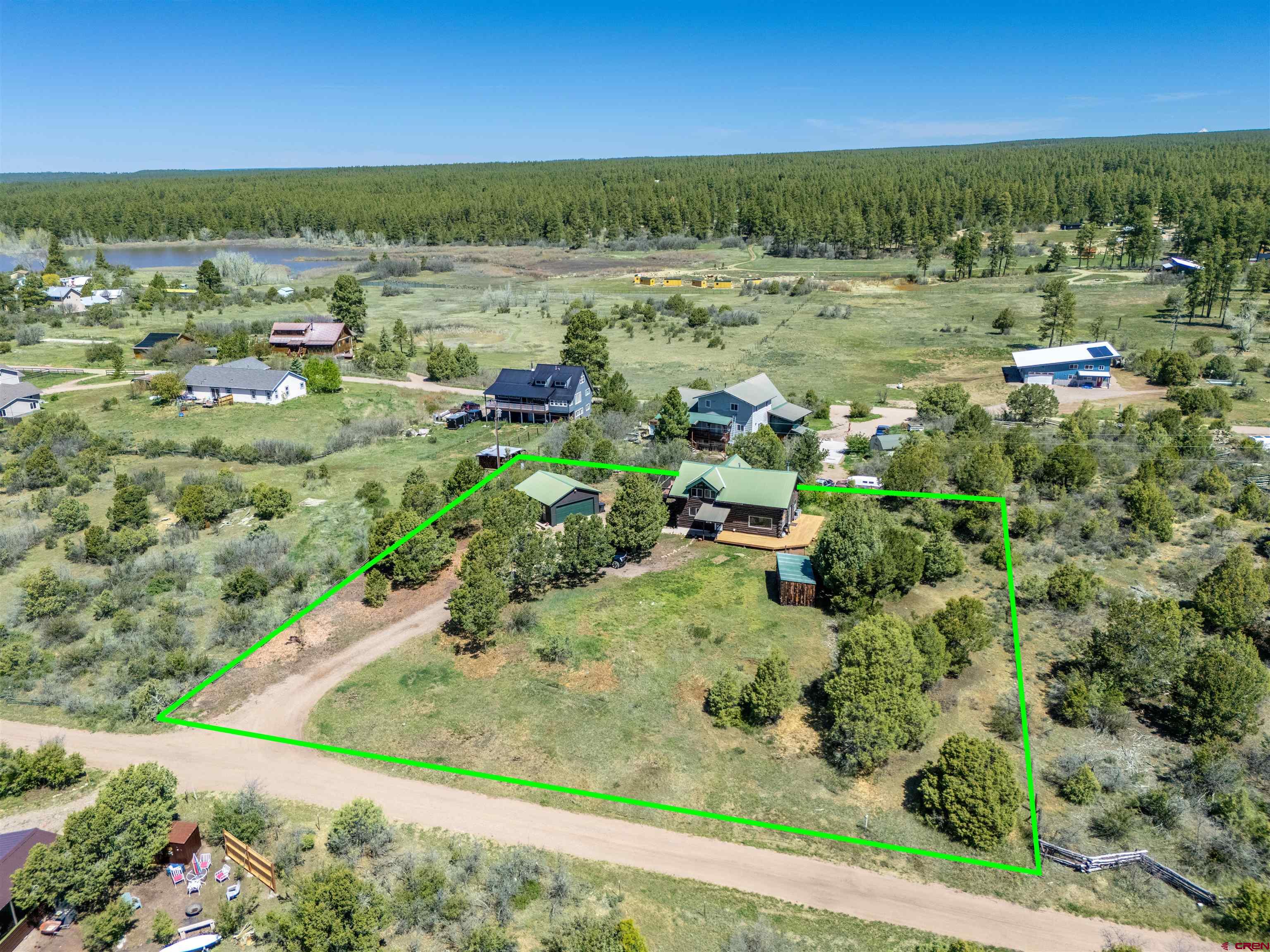 36859 Rd P.2 Mancos, CO 81328 - Photo 23 of 28 a view of a lake with a yard