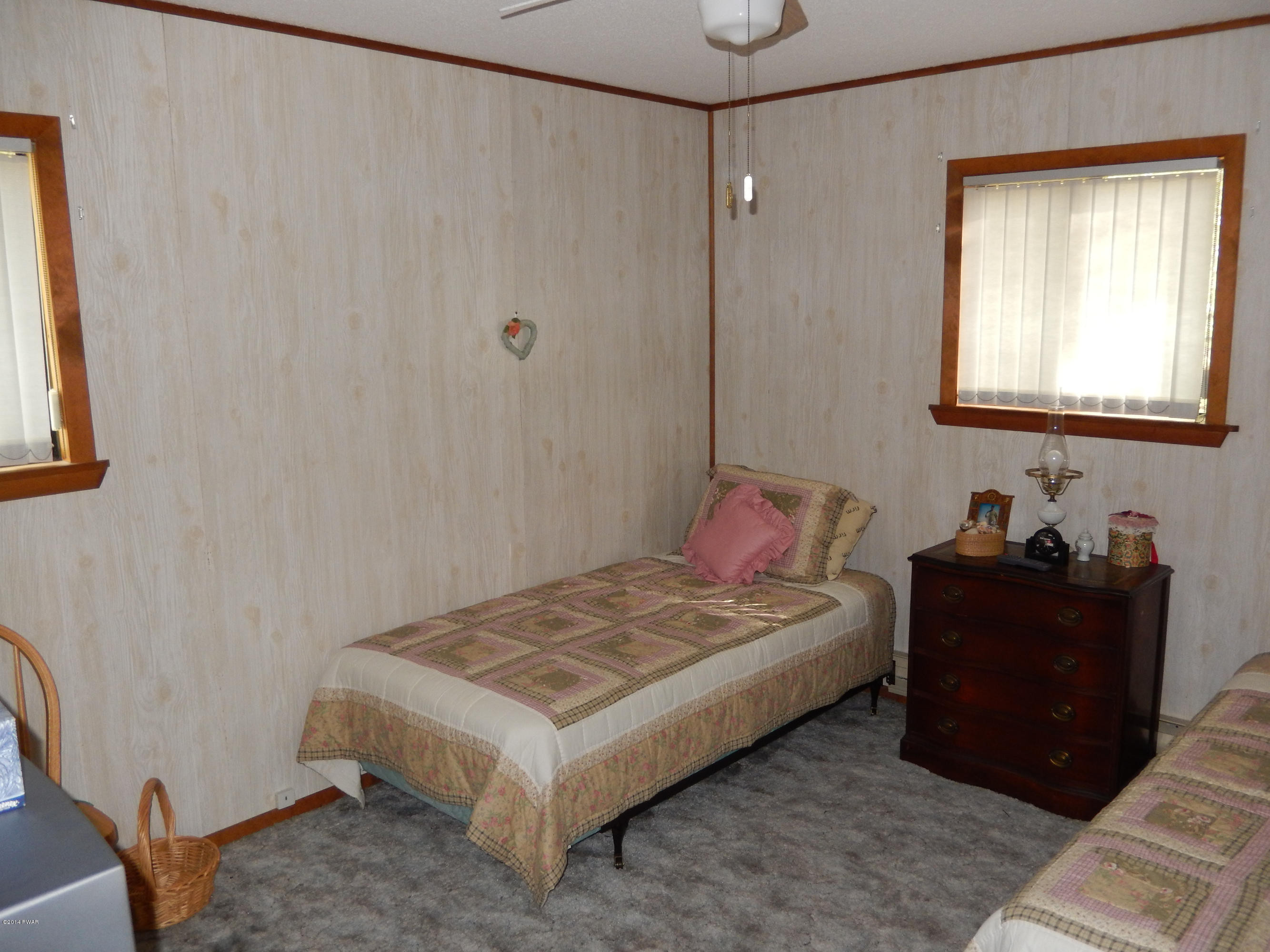 3190 Northgate Road Lake Ariel, PA 18436 - Photo 25 of 56 a bedroom with a bed and a window