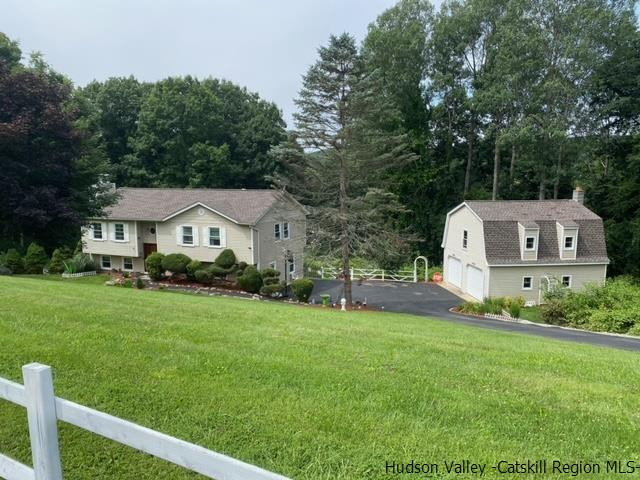 18 Maria Drive Holmes, NY 12531 - Photo 34 of 35 a front view of a house with garden