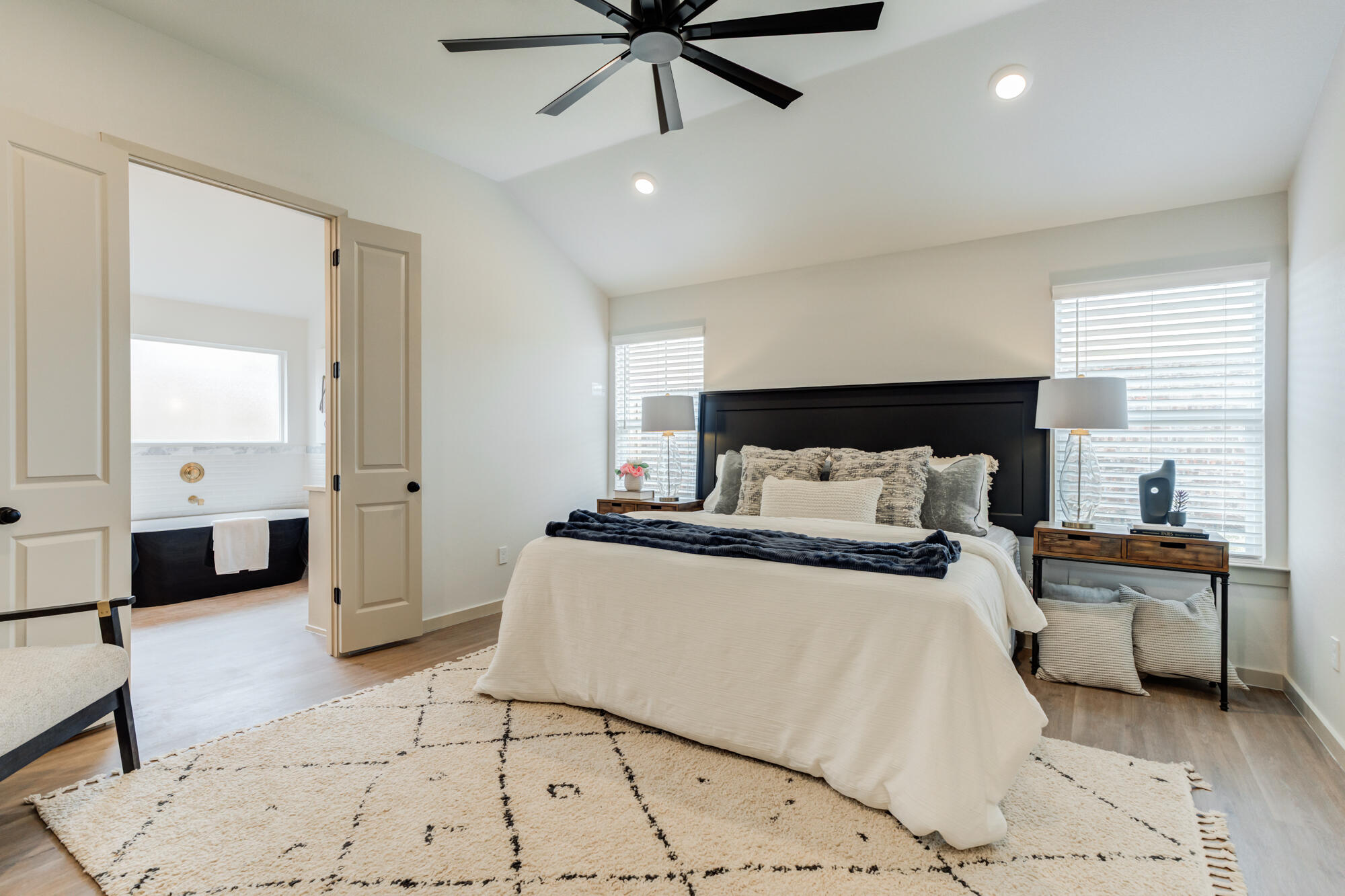 3627 122nd Street Lubbock, TX 79423 - Photo 25 of 49 a living room with a bed and furniture