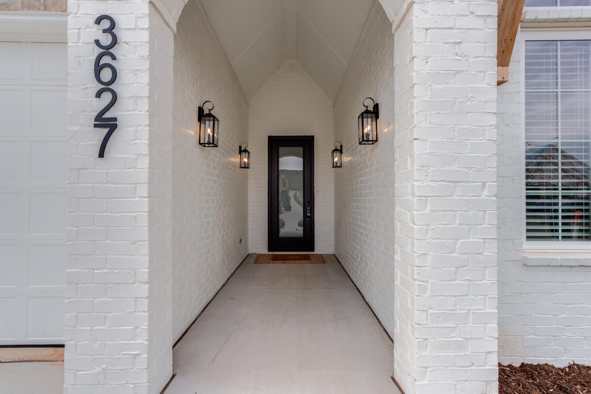 3627 122nd Street Lubbock, TX 79423 - Photo 4 of 49 a view of a hallway with a window