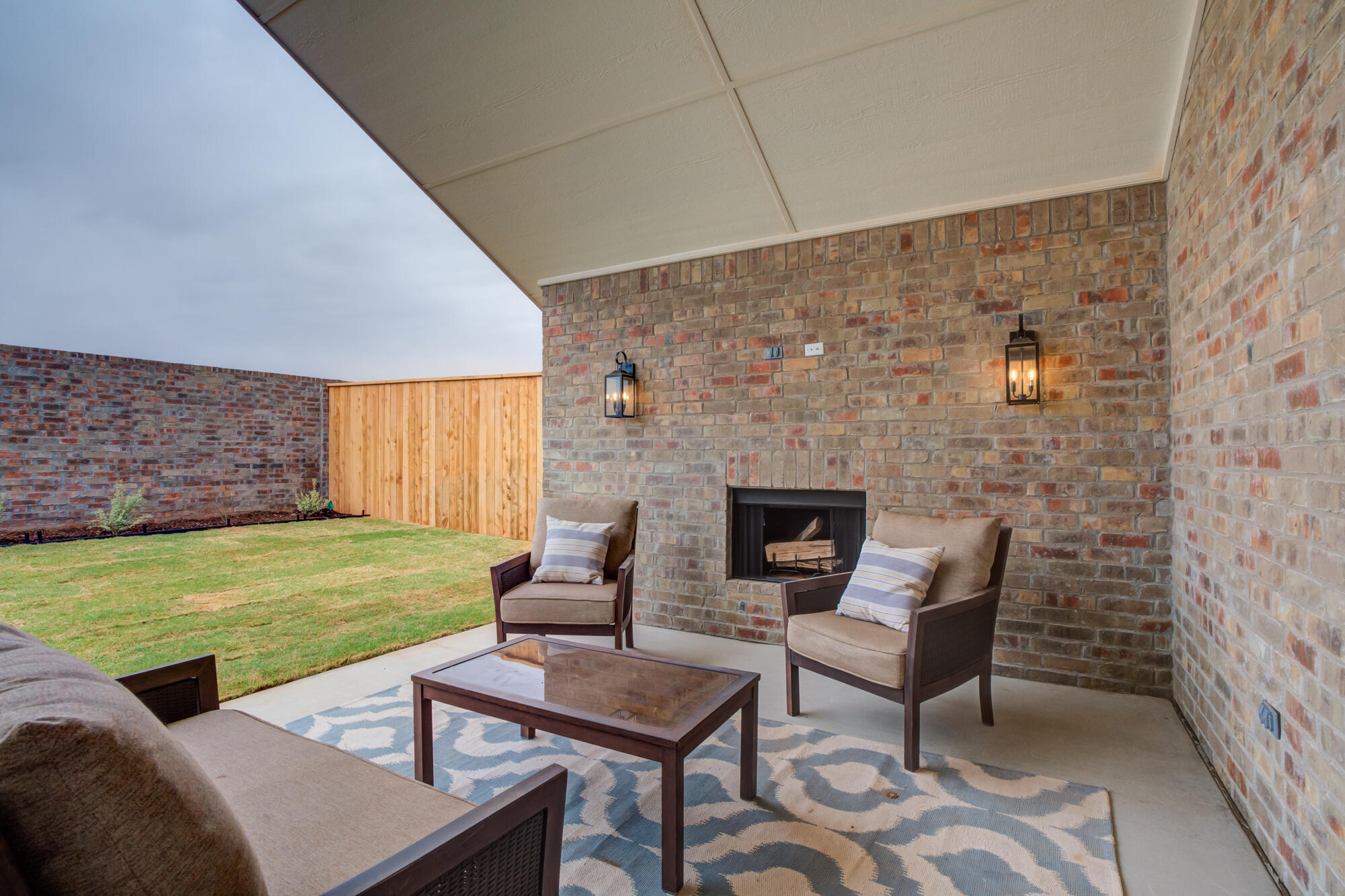 3627 122nd Street Lubbock, TX 79423 - Photo 44 of 49 a backyard of a house with outdoor seating