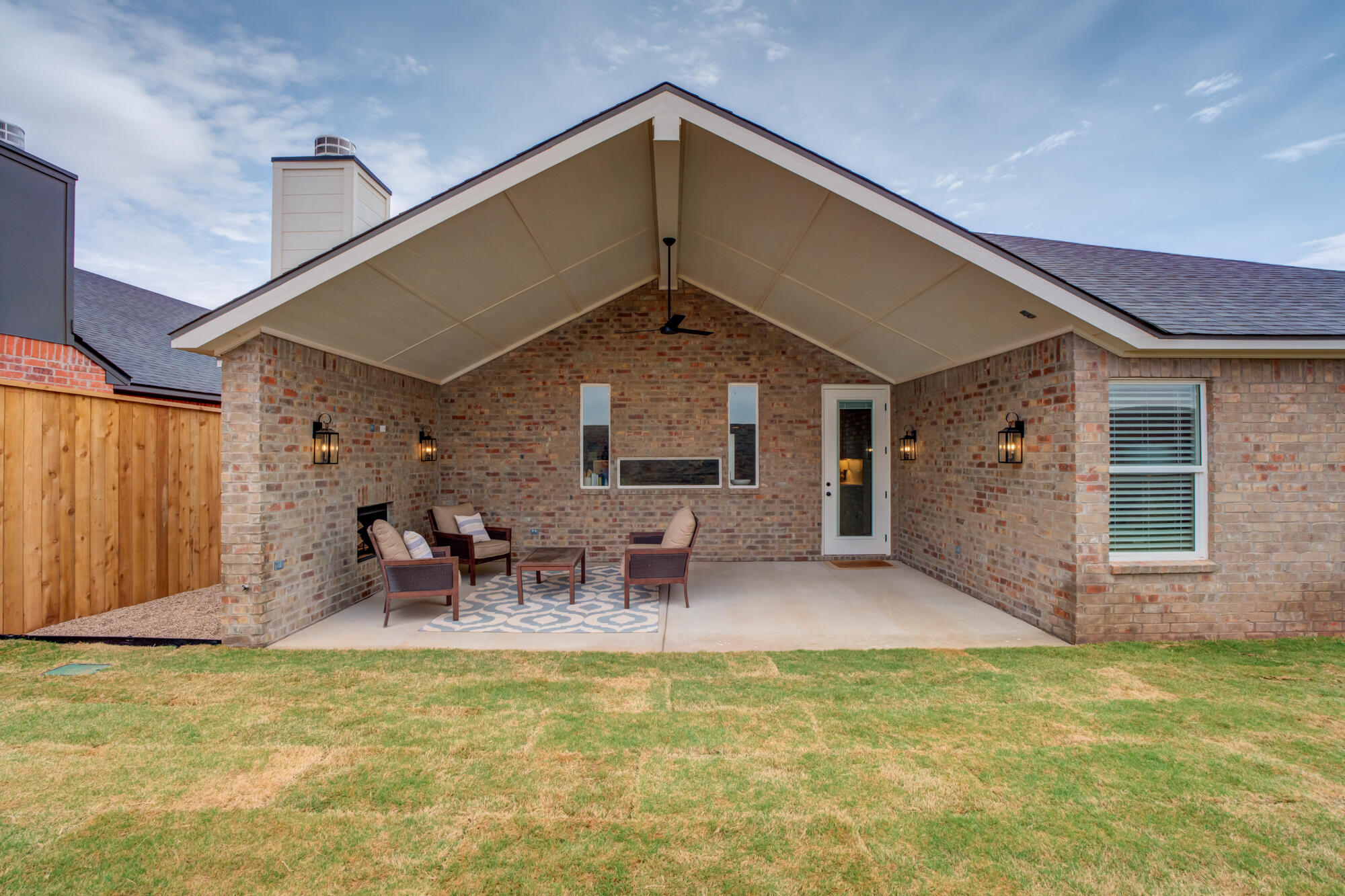 3627 122nd Street Lubbock, TX 79423 - Photo 48 of 49 a view of a house with a patio and a yard