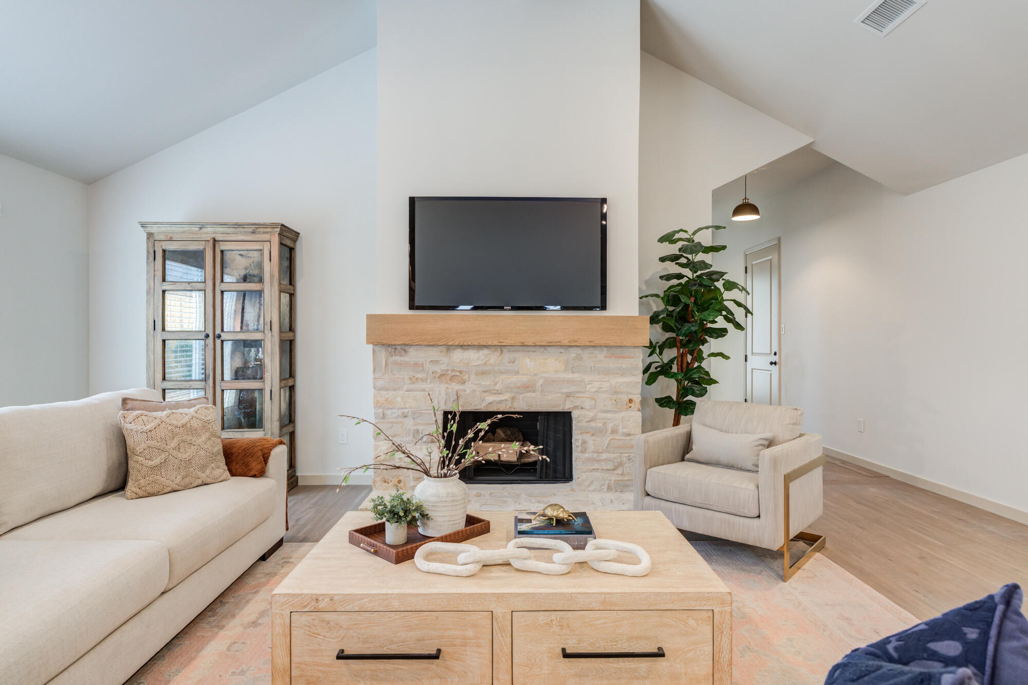 3627 122nd Street Lubbock, TX 79423 - Photo 9 of 49 a living room with furniture and a fireplace