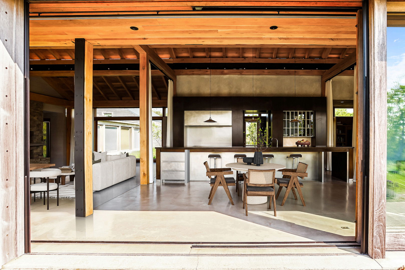 33 Boldwater Road Edgartown, MA 02539 - Photo 12 of 20 a view of a dining hall with dining table and chairs