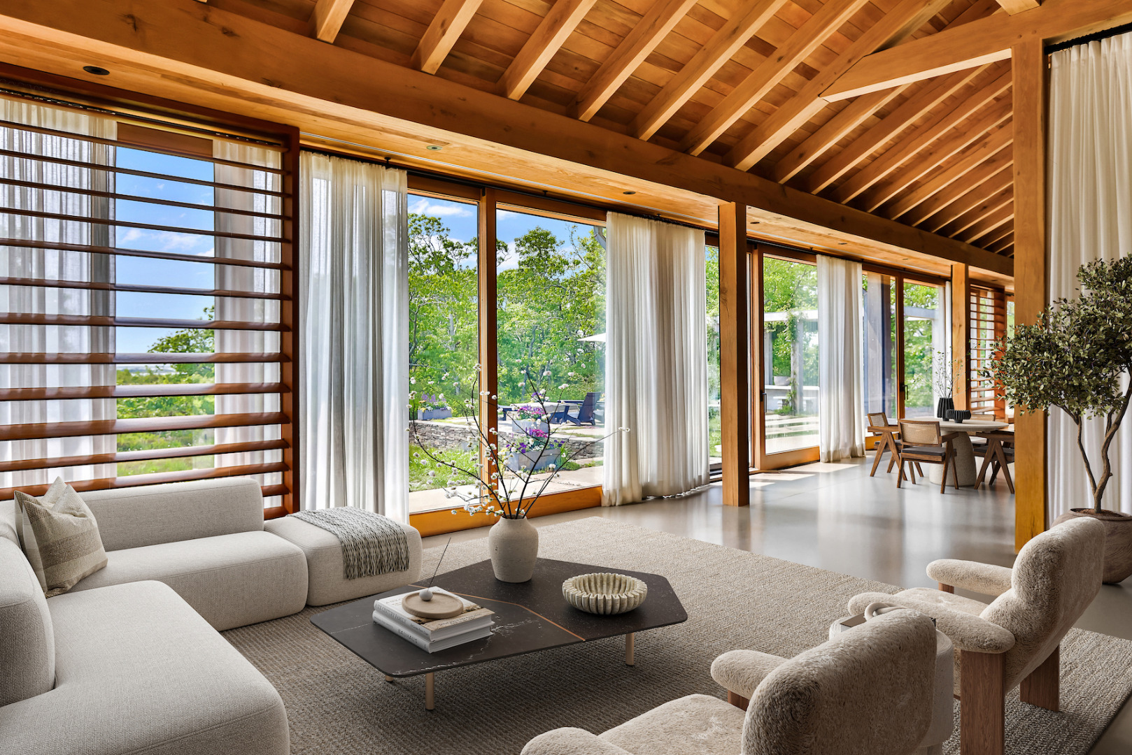 33 Boldwater Road Edgartown, MA 02539 - Photo 4 of 20 a living room with furniture and floor to ceiling windows