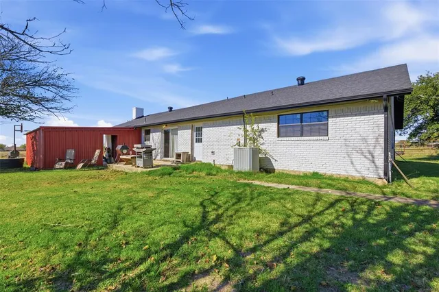 a view of a garden with trees
