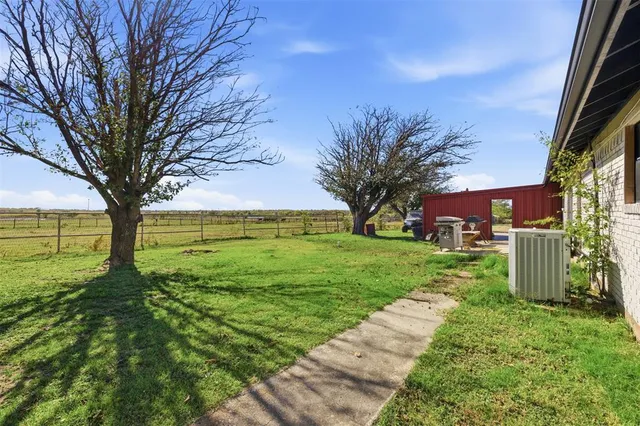 a outdoor view of a building with traffic signal lights