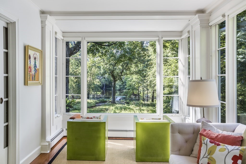 39 Musketaquid Road Concord, MA 01742 - Photo 23 of 40 a living room with a couch and a large window
