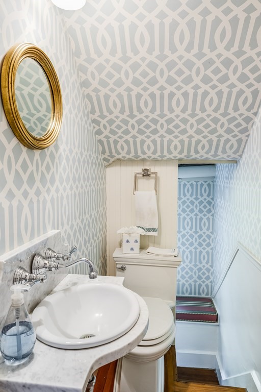 39 Musketaquid Road Concord, MA 01742 - Photo 25 of 40 a bathroom with a sink and a mirror