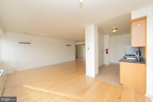 a view of a kitchen with a sink