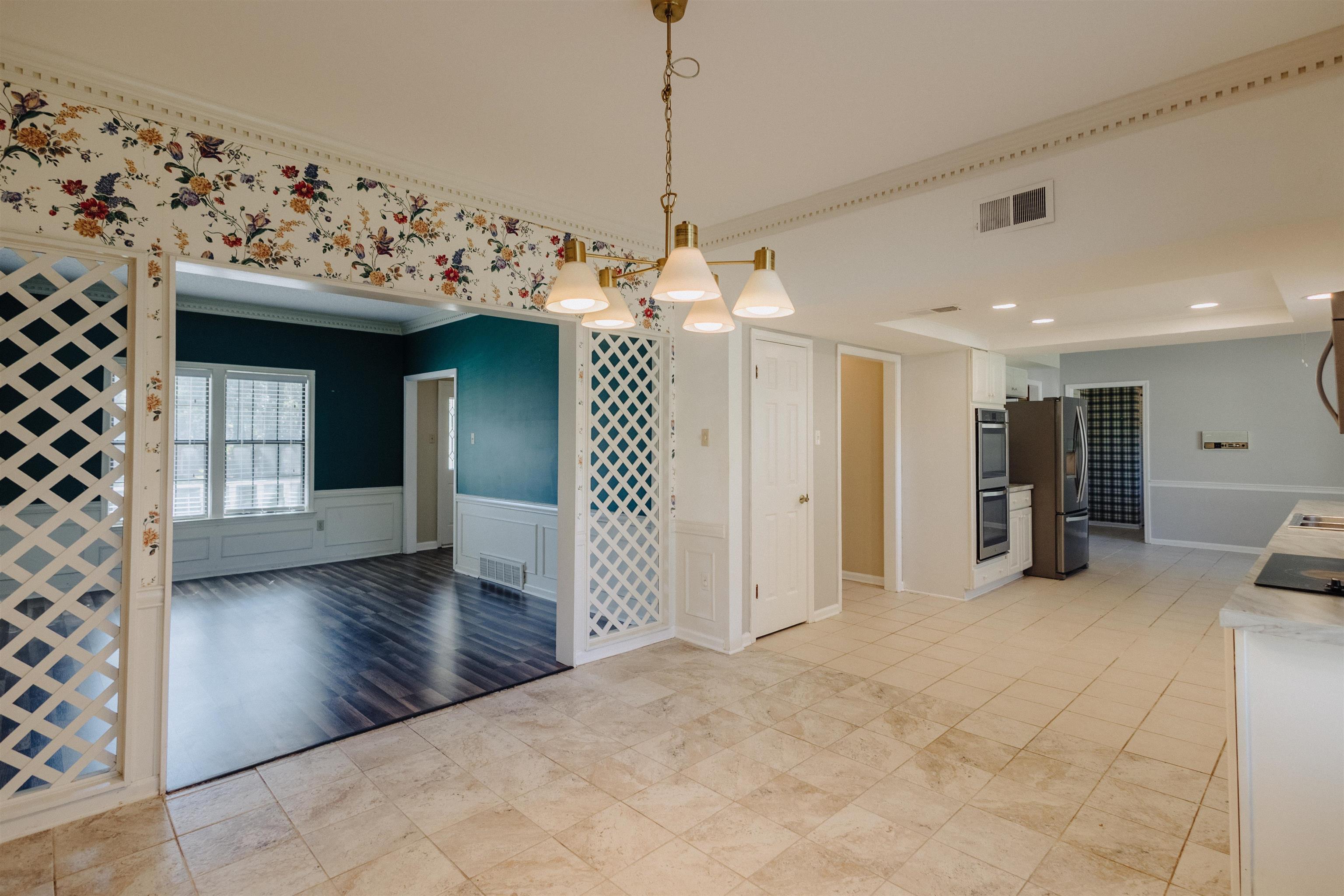 2375 Cherry Spring Cove Memphis, TN 38016 - Photo 13 of 33 a view of a livingroom with a chandelier