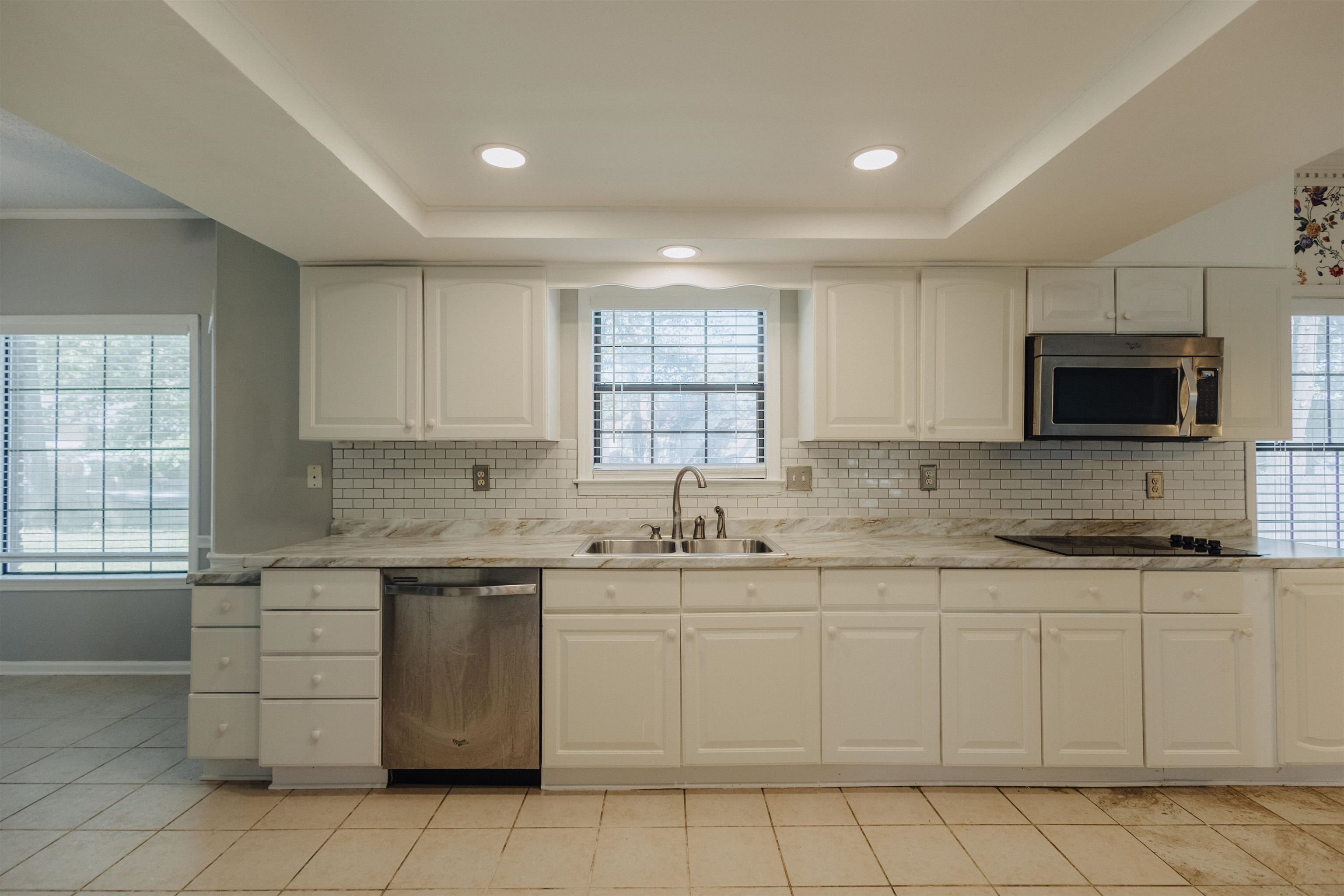 2375 Cherry Spring Cove Memphis, TN 38016 - Photo 14 of 33 a kitchen with a sink stove and cabinets