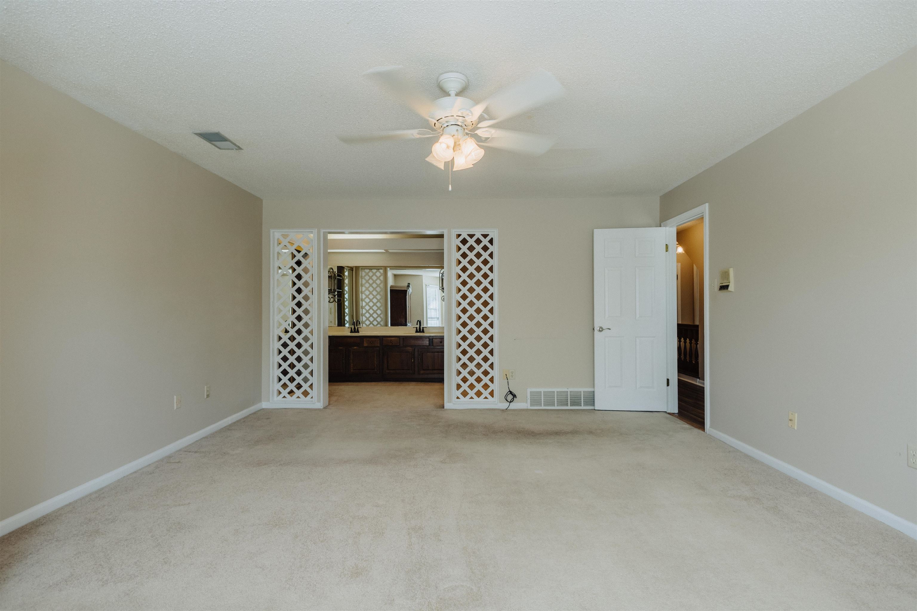 2375 Cherry Spring Cove Memphis, TN 38016 - Photo 19 of 33 a view of a livingroom with a ceiling fan and window