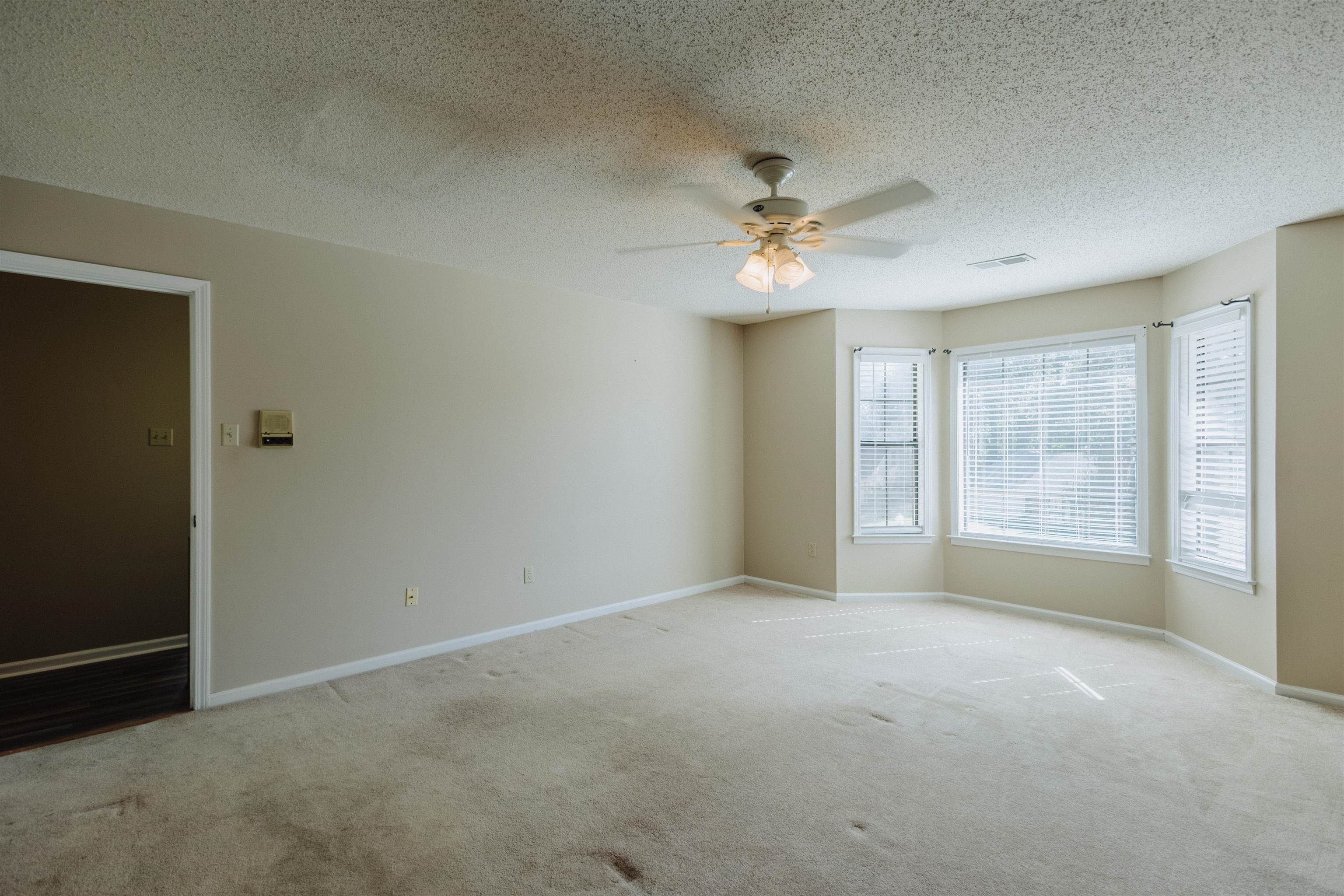 2375 Cherry Spring Cove Memphis, TN 38016 - Photo 20 of 33 a view of an empty room with a window