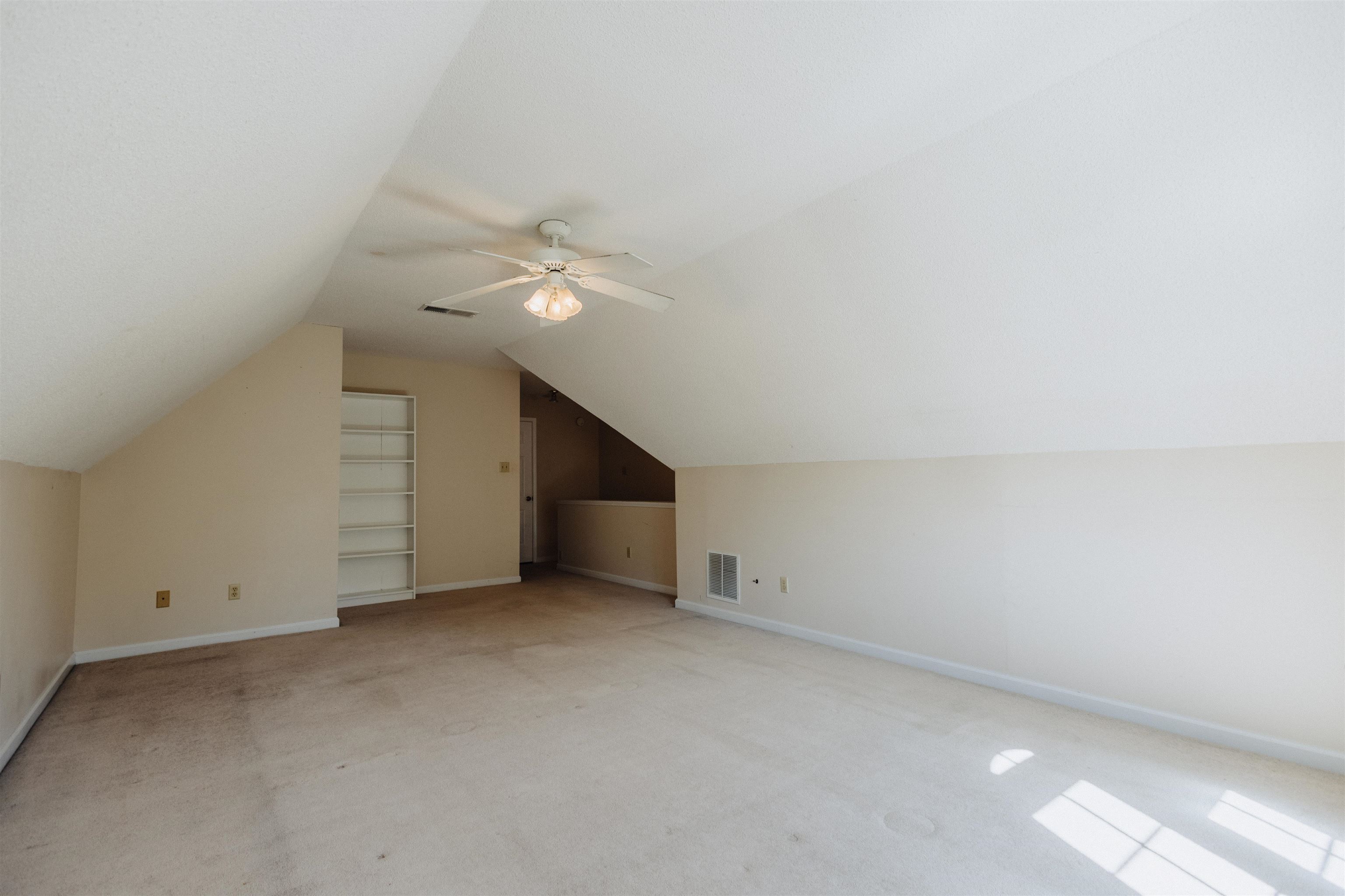 2375 Cherry Spring Cove Memphis, TN 38016 - Photo 30 of 33 a view of an empty room with a ceiling fan