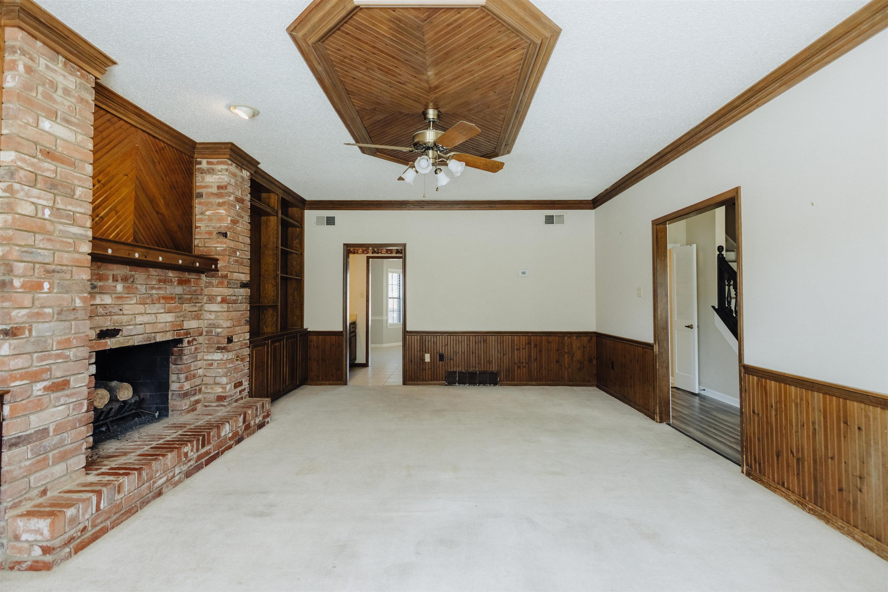 2375 Cherry Spring Cove Memphis, TN 38016 - Photo 8 of 33 a view of an empty room with a fireplace