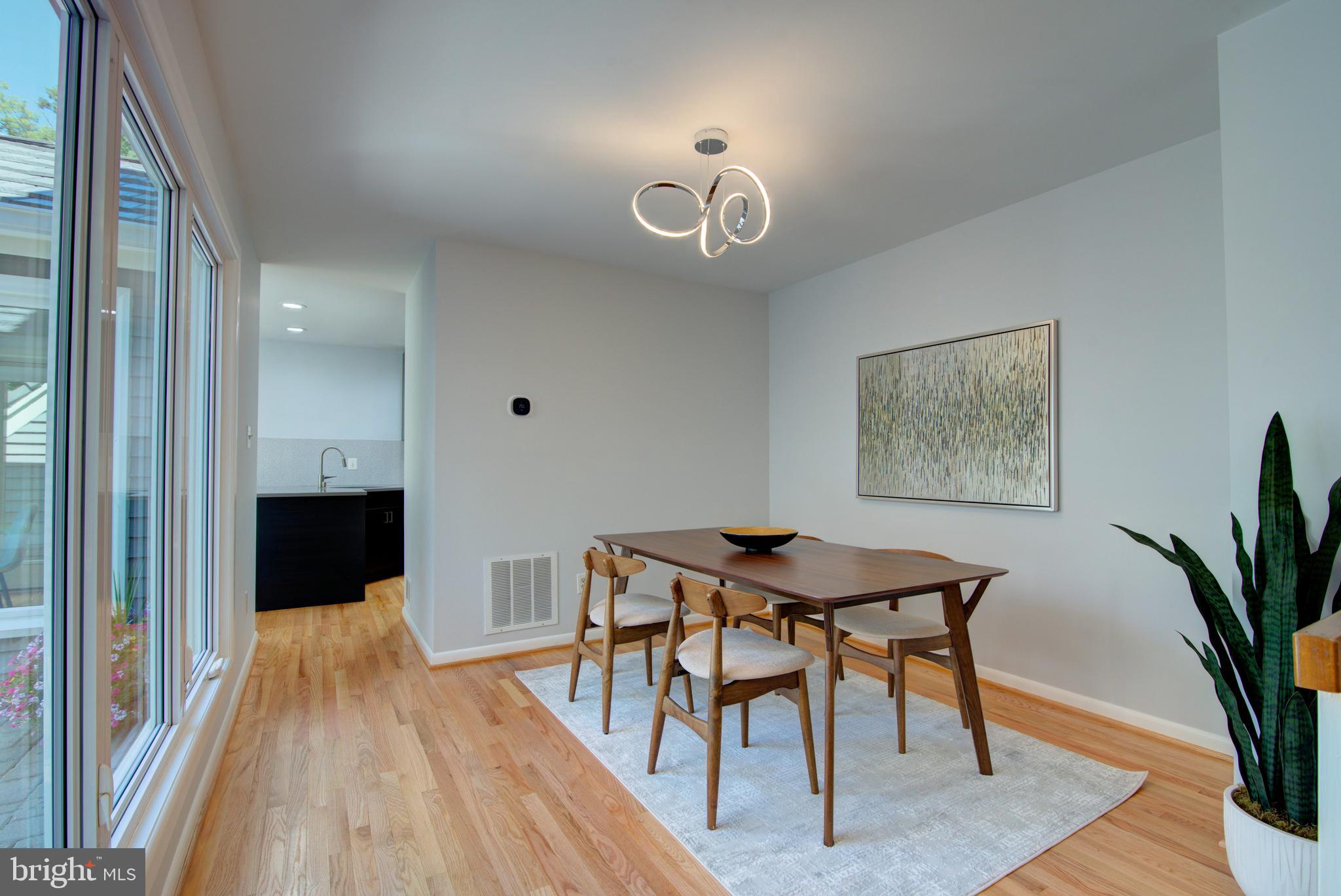11619 Chapel Cross Way Reston, VA 20194 - Photo 11 of 33 Dining Room Leads to Kitchen.